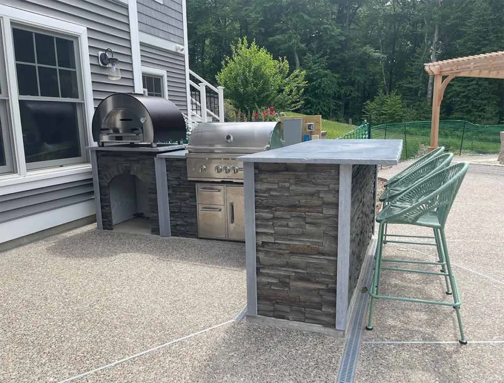 L-Shaped Outdoor Kitchen with Bar