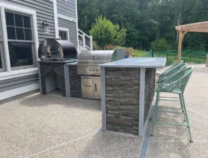 L Shaped Outdoor Kitchen with Bar